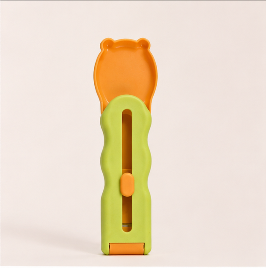 yellow cat treat feeder for squeeze snacks