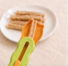 yellow cat treat feeder for squeeze snacks - view 3